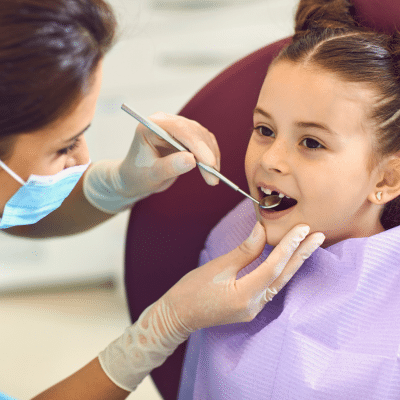 Little girl at the pediatric dentist for her dental health