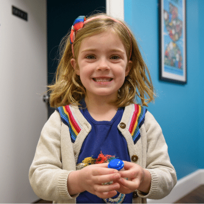 Pacifier use and dental development 3 Little girl smiling at rva pediatric dentistry, representing pacifier use and dental development